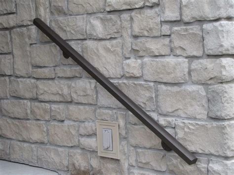 installing metal brackets on a masonry wall|how to mount handrail bracket.